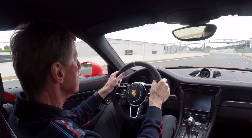 Walter Rohrl driving a Porsche 911 GT3 RS