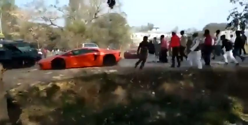Lamborghini, Ferrari stoned by angry mod in India