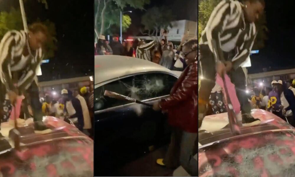 American rappers trash a Rolls Royce Wraith to promote new album